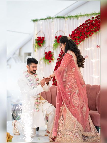A perfect proposal moment captured during an engagement. We added a small sparkler effect to make the moment even more magical, complementing the red rose decor.