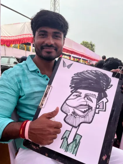 A guest giving a thumbs-up for his caricature. It's great to get such positive feedback.