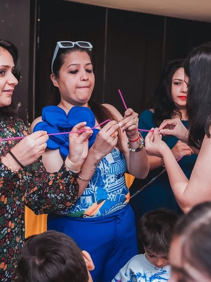 Another shot of our party games in full swing. We facilitate activities that are designed to be inclusive, fun, and get everyone involved in the celebration.