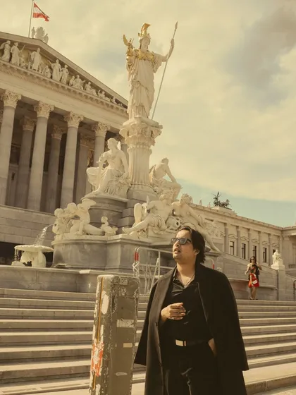 Looking up at the grand architecture of Vienna. The history and art of the places I visit always find a way into my music.
