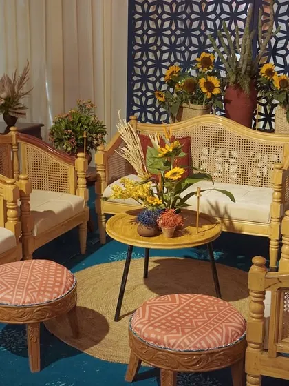 A cozy lounge setup at the 'Moroccan Nightfall' event. We used cane furniture and custom-printed pouffes to continue the rustic, patterned theme throughout the space.