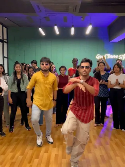The 'Laal Peeli Akhiyan' workshop is pure energy. This song from a recent blockbuster is a favorite for its powerful beat and fun, signature steps.