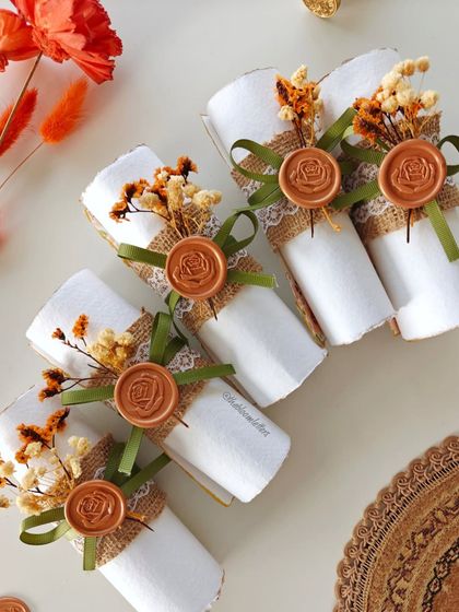 A closer look at the details of my rustic wedding vow scrolls. The combination of jute, lace, dried florals, and a custom wax seal creates a warm, organic, and timeless feel.