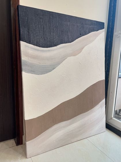 A 3ft x 4ft textured abstract landscape on its way to Mumbai. This piece uses bands of different textures and neutral colors to create a minimalist interpretation of rolling hills.