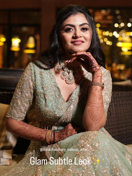 A glam and subtle look for an evening event. The makeup is polished and sophisticated, perfect for a reception or cocktail party.