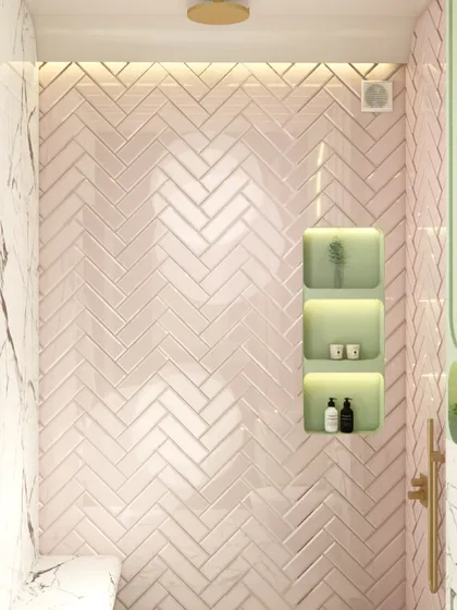 A detail shot of the pink herringbone tile in the kids' bathroom shower. The texture and color add a soft, playful element to the space.