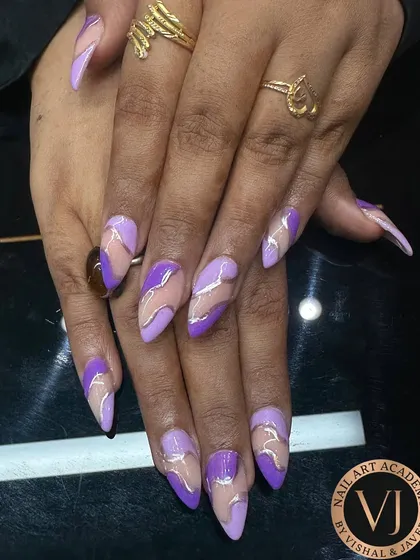 We love playing with abstract shapes and colors. This design uses shades of lavender and violet with elegant gold swirls for a modern, artistic look.