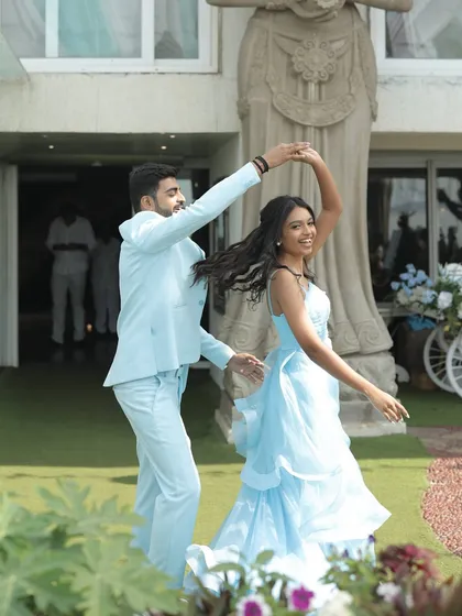 A playful twirl during a pastel-themed brunch. We help couples choose themes and color palettes that reflect their style for every single event.