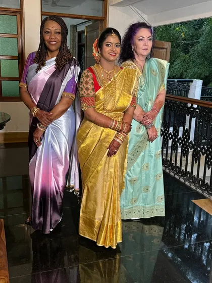 A beautiful bride with her international guests. It was an honor to style her for this fusion wedding, blending traditional Indian elegance with a celebration of different cultures.