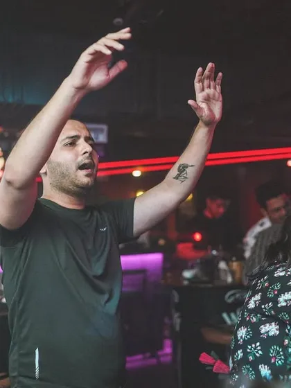 Hands up for the weekend. The crowd's energy fuels my performance all night long.