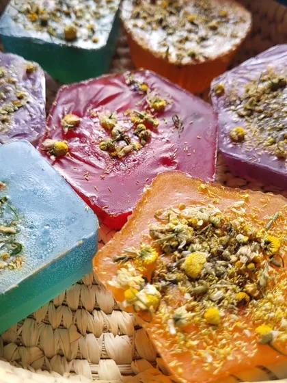 A closer look at the different colored Chamomile soaps. Each one is infused with real chamomile to calm and soothe the skin.