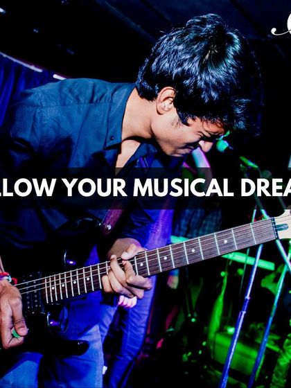 We are here to help you follow your musical dreams. This student is captured in his element during a live performance, a key experience we encourage at our school.