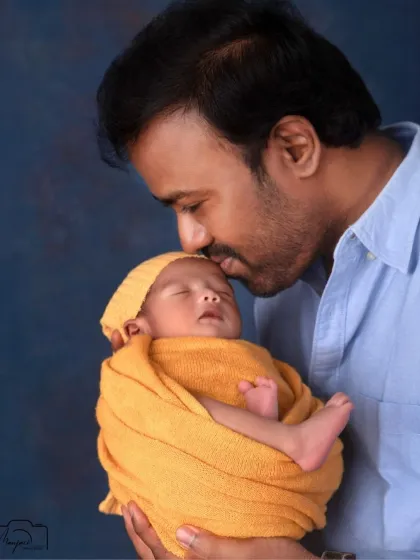 The powerful, quiet bond between a father and his newborn. These moments of connection are just as important, and I make sure to capture the love from every member of the family during our session.