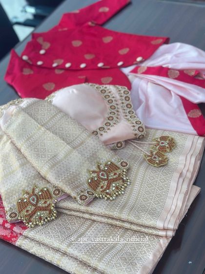 A close-up of the matching embroidery details on the mother-son set.