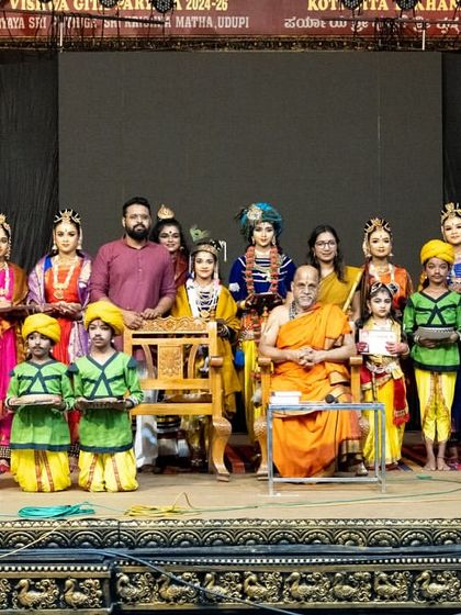 Our full cast on stage with the revered seer of Puttige Matha at Udupi. It was a great honor for our entire team to perform and receive blessings at such a holy event.