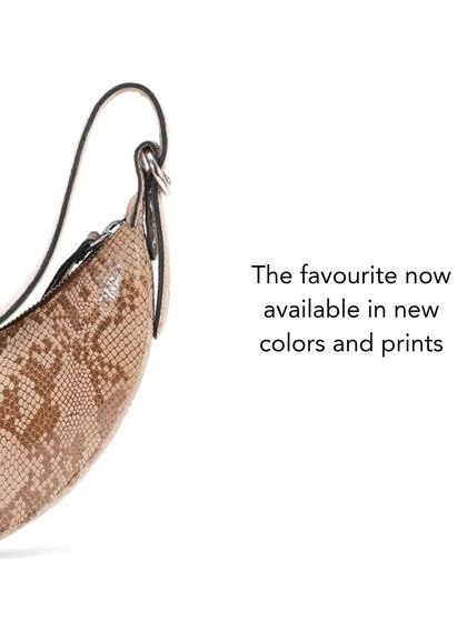 Announcing new colors and prints for our favorite Selena bag. This image showcases the beautiful texture of the snakeskin-embossed leather.