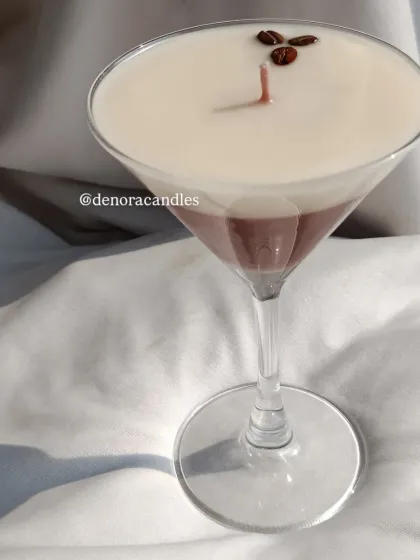 A side profile of the coffee martini glass candle, highlighting its sleek and sophisticated design.