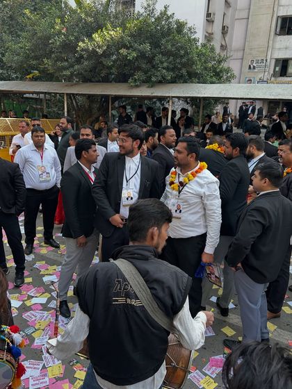 The atmosphere during the SBA elections, with dhol players and supporters. This is a demonstration of the vibrant spirit of our advocate community.