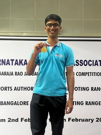 Bhavin, our gold medalist in the 50M Senior category, proudly displays his medal.