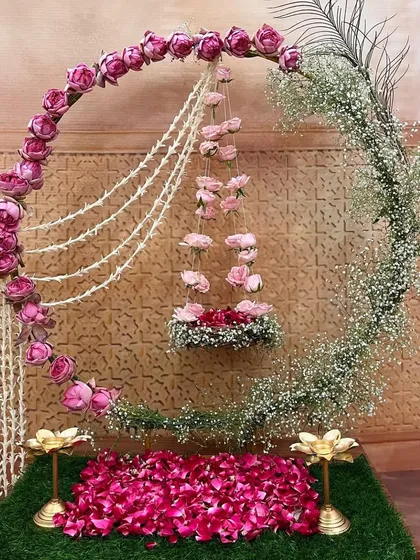 This dreamy moon-gate arch is a romantic and unique choice for Ganpati or an engagement, creating a magical, celestial vibe.