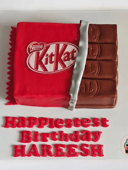 Have a break with this giant KitKat cake. I sculpted this to look exactly like the iconic chocolate bar, making it a fun and surprising centerpiece for a true chocolate lover's birthday.