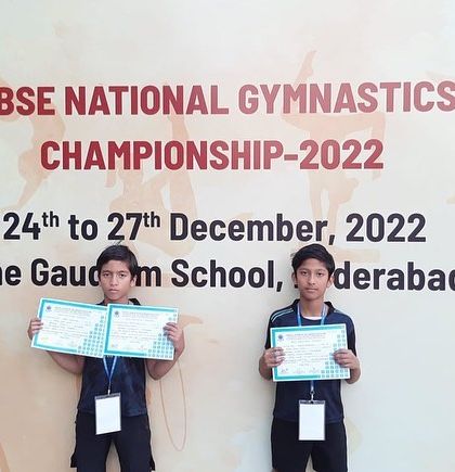 Our two boys at the CBSE National Gymnastics Championship in Hyderabad, proudly holding their certificates.