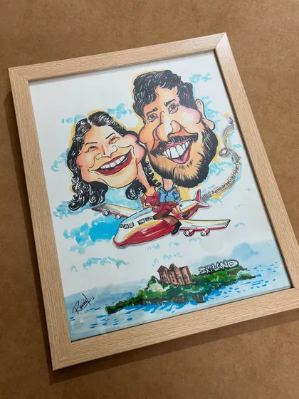 The final, framed version of the traveling couple. The light wood frame complements the bright and airy feel of the watercolor painting perfectly.