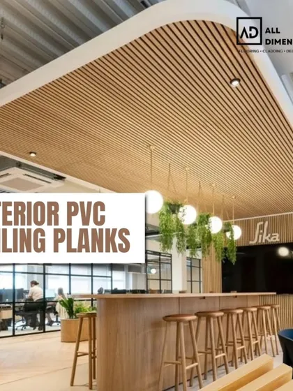 For this commercial space, I installed light wood-finish interior PVC ceiling planks. This design element adds warmth and a sense of modern sophistication, while also helping with acoustics in a busy environment.