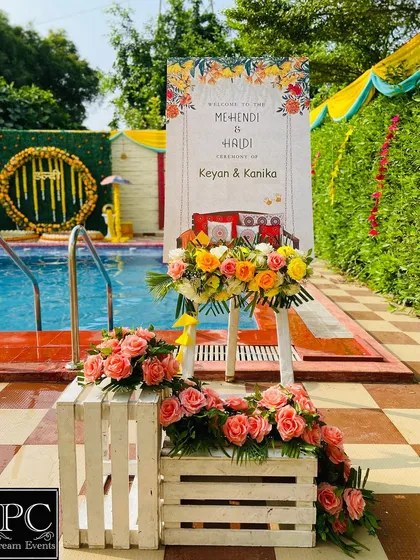 A personalized welcome to the Mehndi and Haldi ceremony. I love creating these custom signs and pairing them with fresh flowers to set the tone for the event.