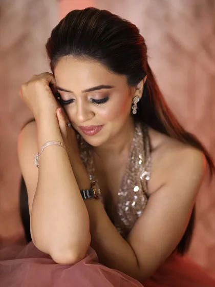 A soft and dreamy close-up. The makeup is blended to perfection, creating a flawless and ethereal look.