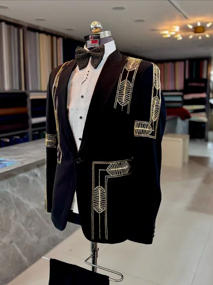 A full shot of the black and gold geometric tuxedo in my studio. The clean lines of the embroidery give this classic suit a very contemporary and architectural feel.