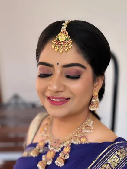 It's all in the eyes. This close-up shows a soft, rosy-hued glam look I created for an engagement party. The blended eyeshadow and defined lashes make the eyes pop while keeping the overall feel romantic and elegant.