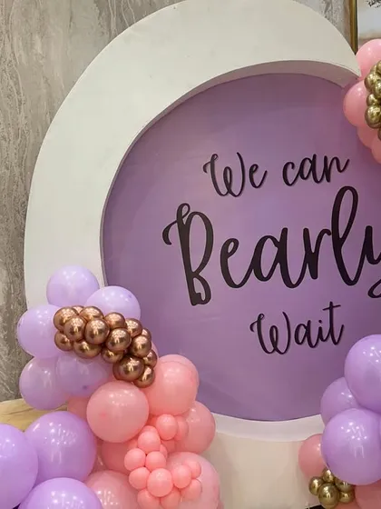 The 'We Can Bearly Wait' signage is a popular and heartwarming touch for any teddy bear themed baby shower.