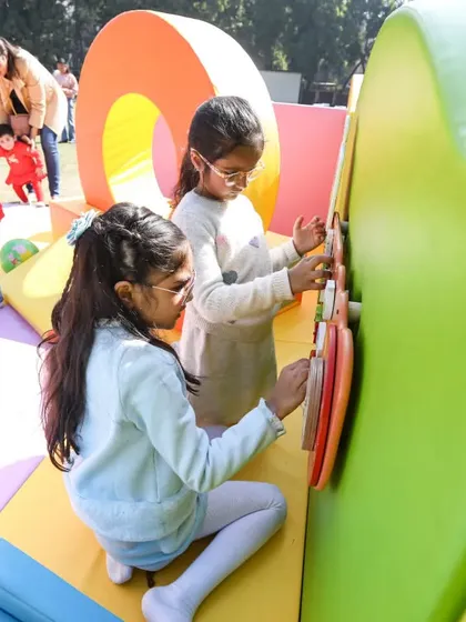 Our wall games are designed to be at the perfect height for kids to gather around and play together.