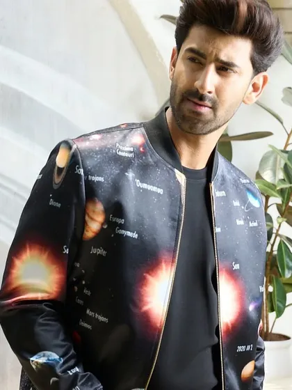 Another view of the celestial satin bomber jacket, perfect for the man who wants his style to be out of this world. The vibrant graphics are a true conversation starter.