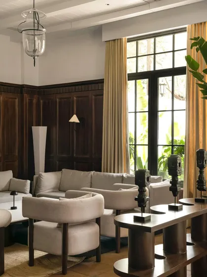 The lounge area, where the arrangement of furniture creates multiple zones for conversation and relaxation.