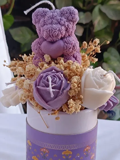 Another view of the purple flower bouquet candle arrangement.