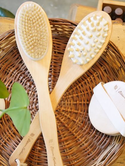 A top-down view of our premium bathing accessories. The set includes brushes with different textures for a customized exfoliation experience.