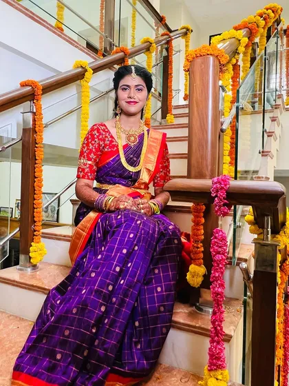 Another beautiful shot of the bride on the stairs. Her smile says it all. The makeup is designed to look great in both natural and indoor lighting.