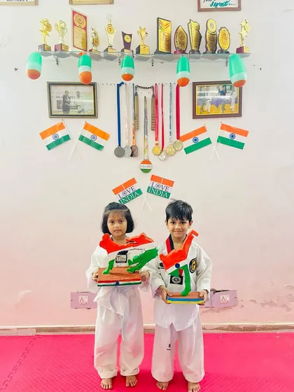 Two little patriots from our academy. We instill a sense of pride and love for our country in all our students from a very young age.