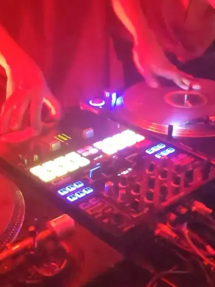 Hands on the vinyl at an Arcade 140 event. These nights are all about bass music, and I use turntablism to add extra texture and rhythm to my dubstep and grime tracks.