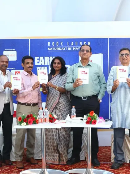 The official book launch photo for 'Earn your Ph.D.' by BWWer Magesh Kumar, standing alongside his esteemed guests. We love to see our writers achieve their publishing dreams.
