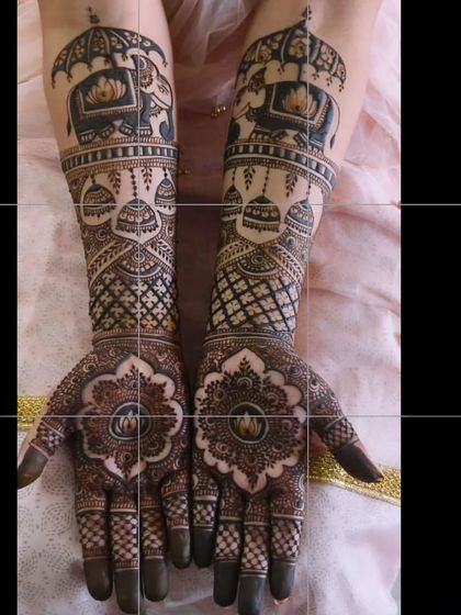 This bridal mehendi combines traditional motifs like elephants and doli with a bold mandala design on the palm for a modern yet classic look.