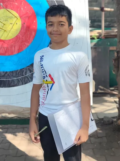 Even our young archers get involved in helping with the scoring, learning all aspects of the sport.