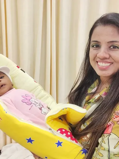 Holding the star of the show, baby Ishani. It's a privilege to be part of such precious moments in a family's life.
