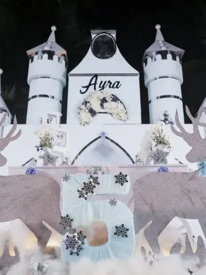 A magical Winter Wonderland created for our little princess Ayra's 5th birthday. The decor features a grand ice castle backdrop, majestic reindeer cutouts, and sparkling snowflakes, turning a birthday party into an enchanting winter dream.