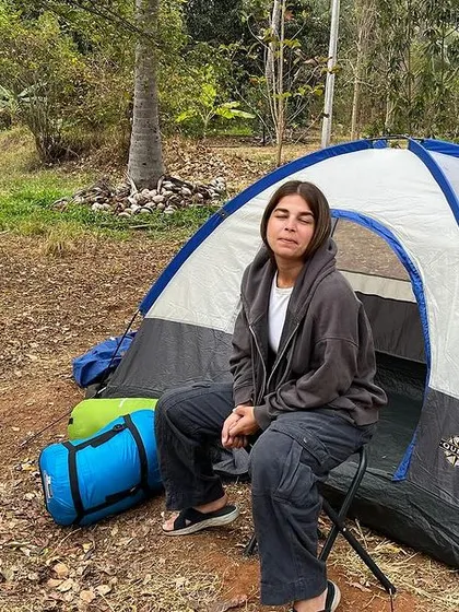A participant relaxing at her tent during the PCGI course. These workshops are intense but also a lot of fun.