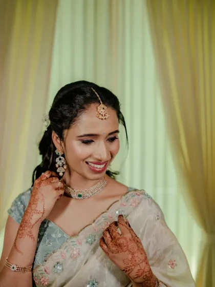 A joyful, smiling shot. This is the result I always aim for: a client who feels beautiful, confident, and happy.