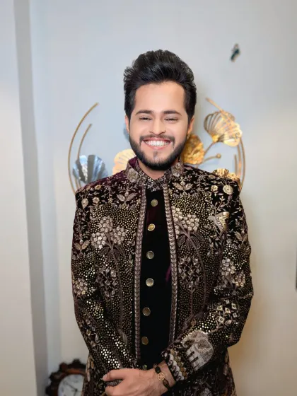 A big smile from a happy groom. My job is to make sure you feel as good as you look on your special day.