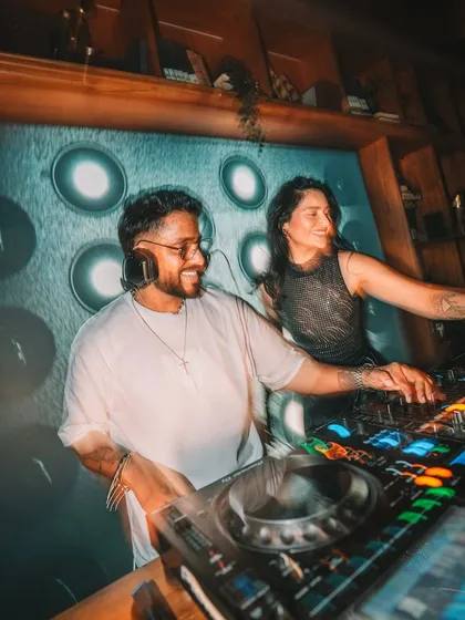 A side-angle shot of us performing together. We work in sync to read the crowd and keep the energy levels high throughout the entire set.